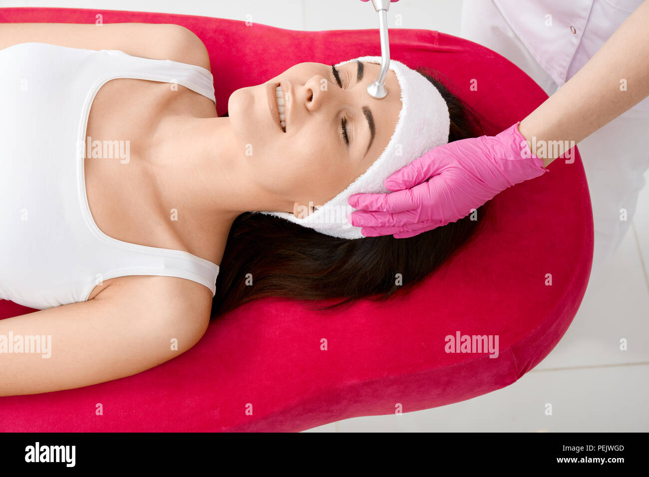 Beauty treatment in professional cosmetic clinic - vacuum massage Stock Photo