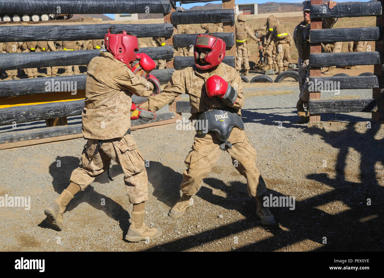 A recruit from Mike Company, 3rd Recruit Training Battalion, applies a choke  hold during a Marine Corps Martial Arts Program test at Marine Corps  Recruit Depot San Diego, July 20. The recruits