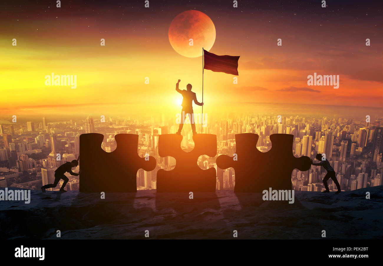 Business concept of teamwork with jigsaw puzzle. Business success Stock Photo