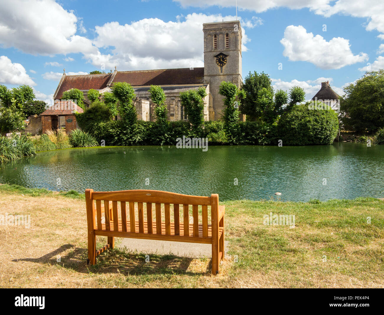 The quintessential English village duck pond and church of St Mary the