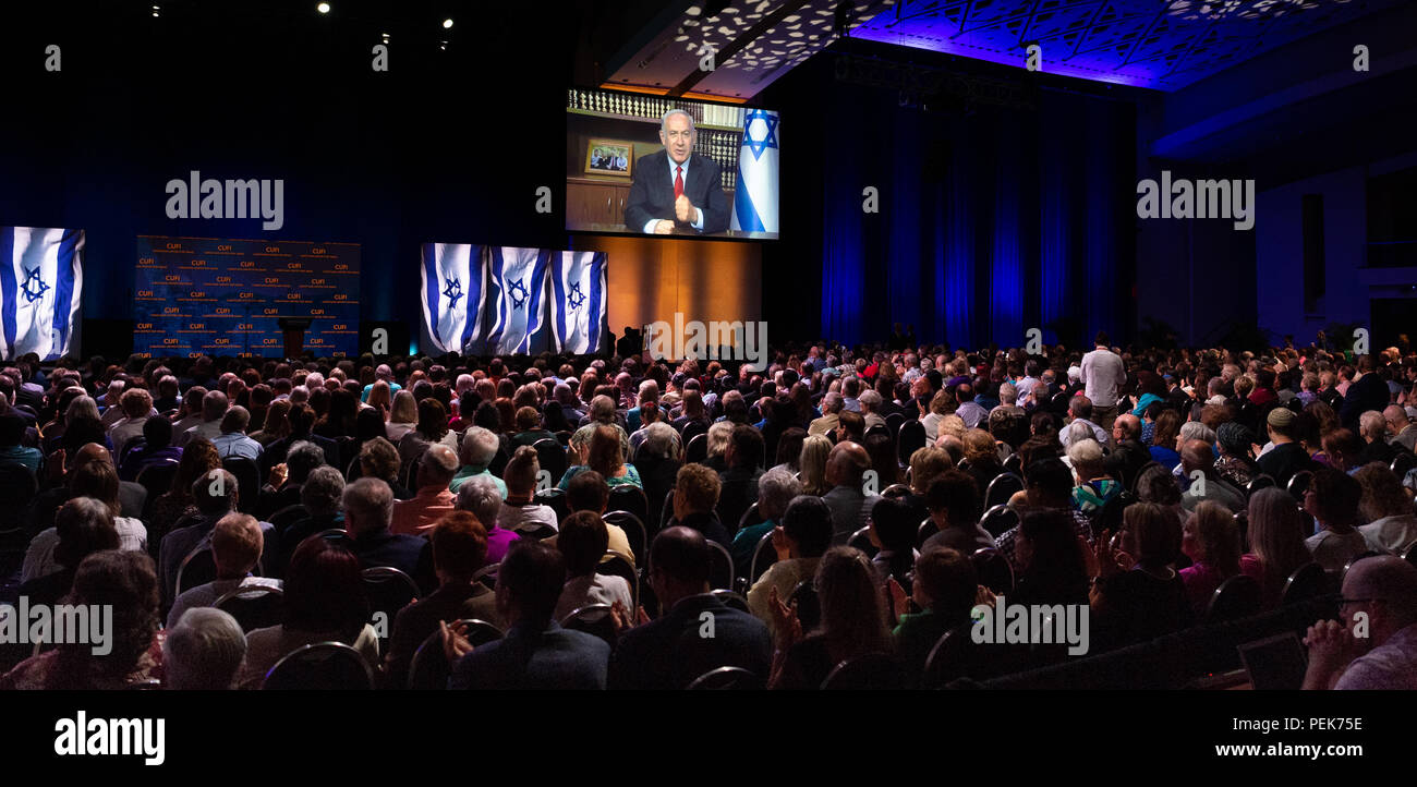 Benjamin Netanyahu, Prime Minister of Israel, speaking via live video conference at the (CUFI) Christians United for Israel's 2018 Washington Summit h Stock Photo
