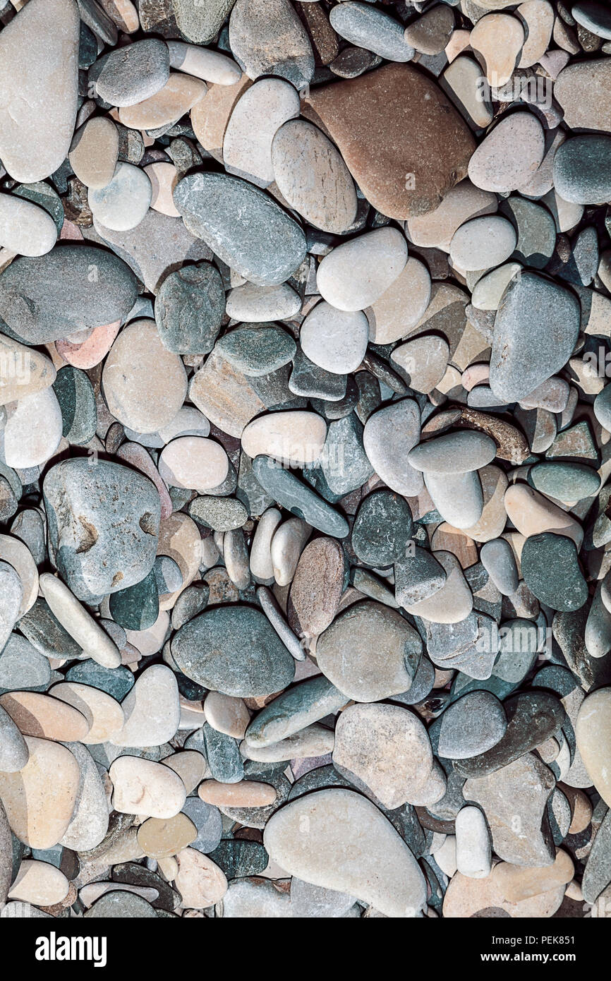 Naturally polished rock pebbles background. Sea stone wallpaper Stock Photo - Alamy Naturally polished rock pebbles background. Sea stone wallpaper Stock Photo - Alamy
