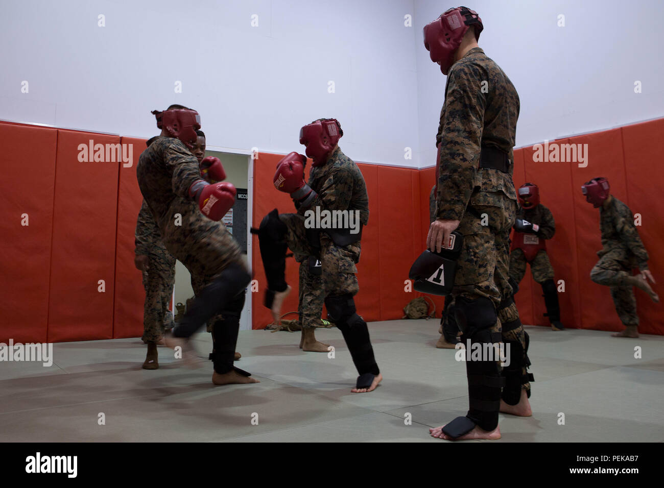 Marines spar during the Marine Corps Martial Arts Instructor course Dec. 11 aboard Camp Foster