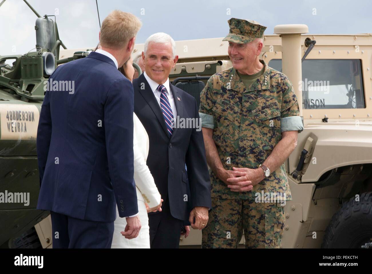 U.S Vice President Mike Pence, center, and Joint Chiefs Chairman Gen. Joseph Dunford, right, during a visit to the 10th Mountain Division, for the signing of the John McCain National Defense Authorization Act August 13, 2018 in Fort Drum, New York. Stock Photo