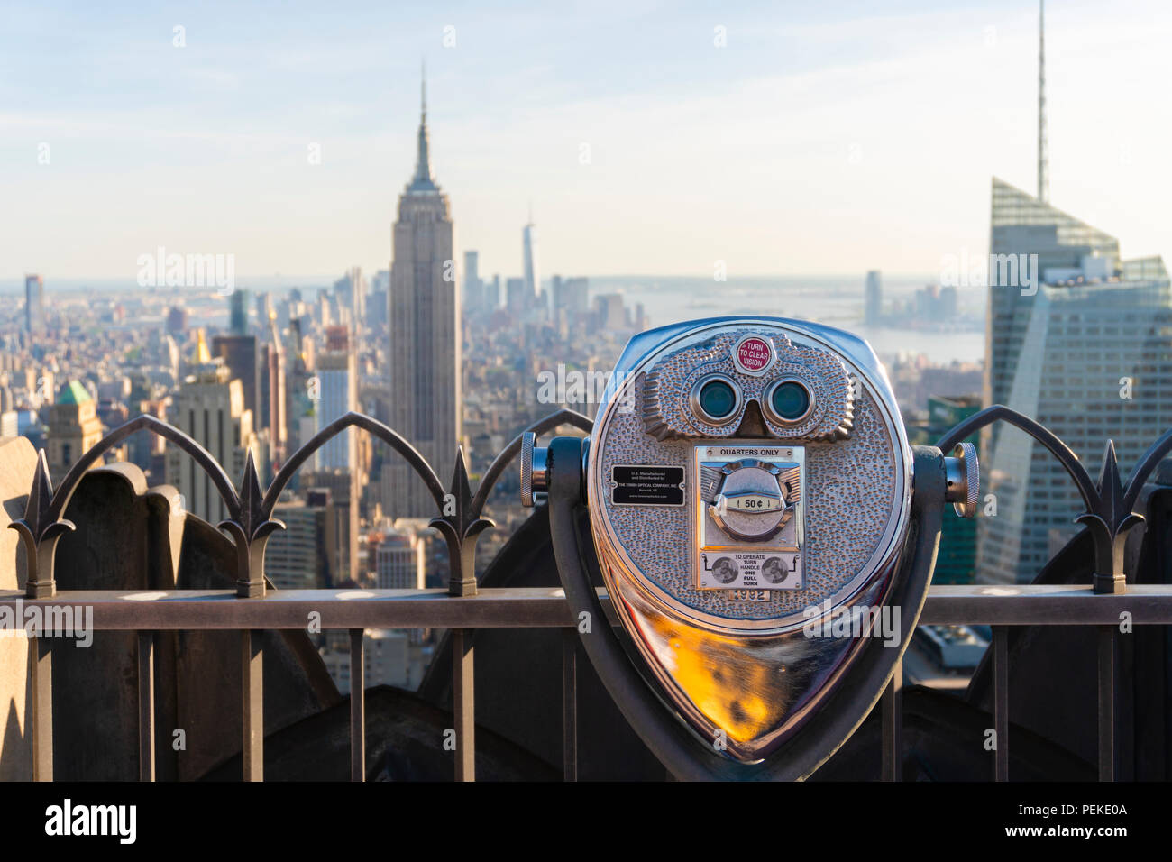 Tower binoculars facing Manhattan skyline in New York City Stock Photo