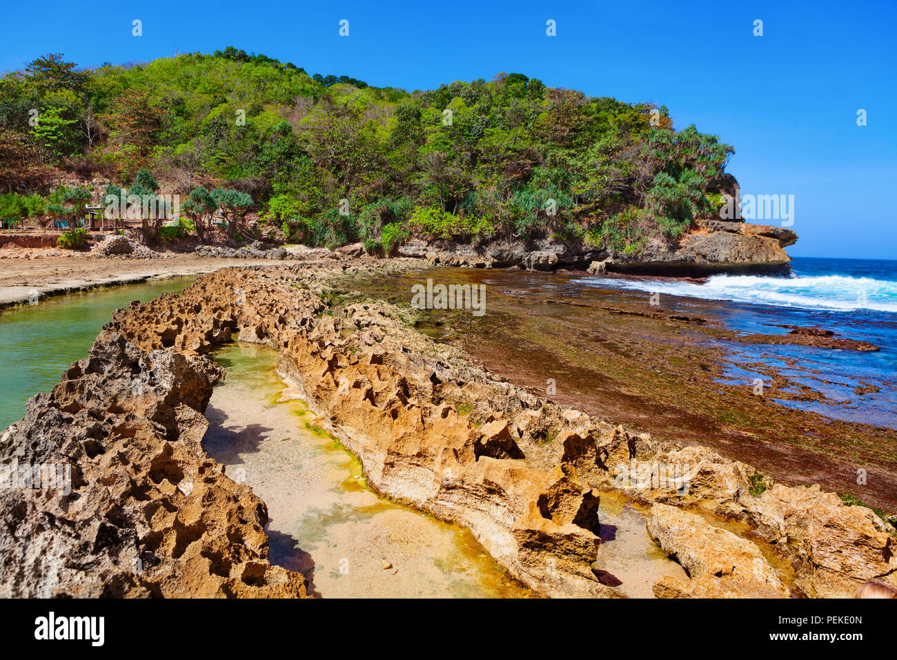 Travel Destination In East Java Pantai Batu Bengkung Beach