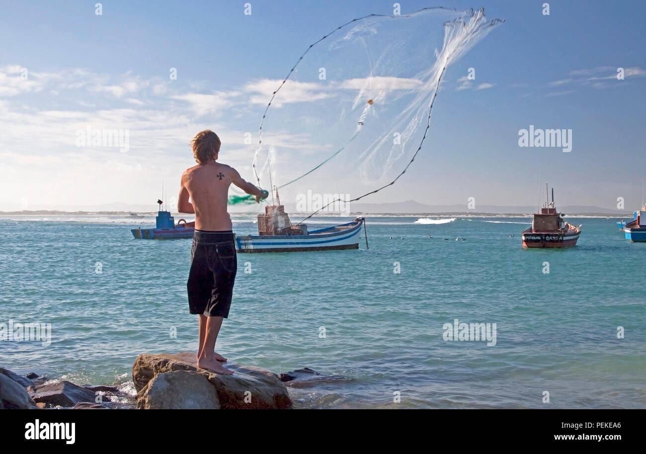 Throwing out the fishing net Stock Photo