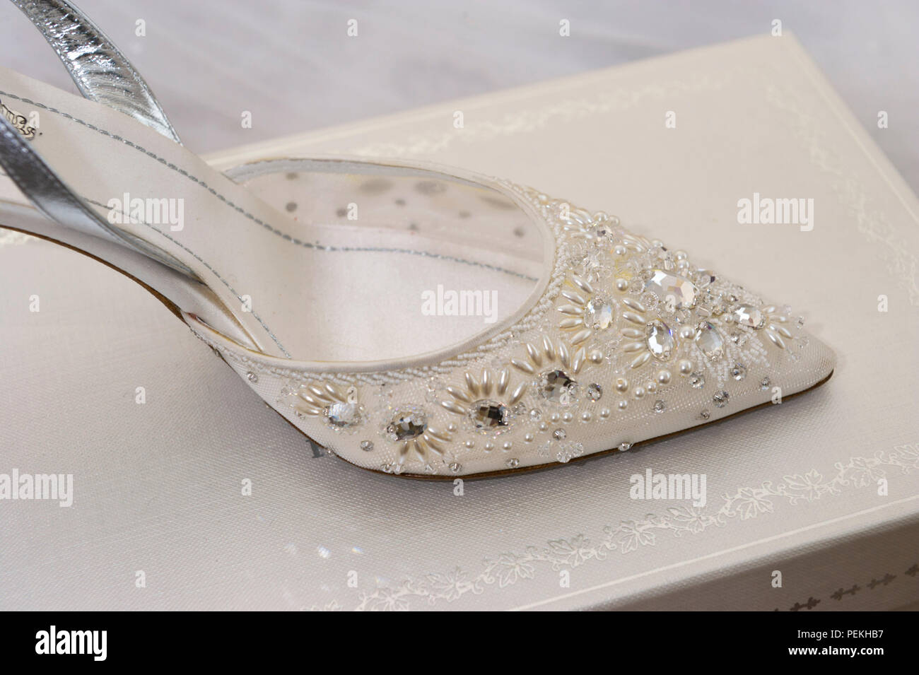 White wedding shoe Stock Photo - Alamy