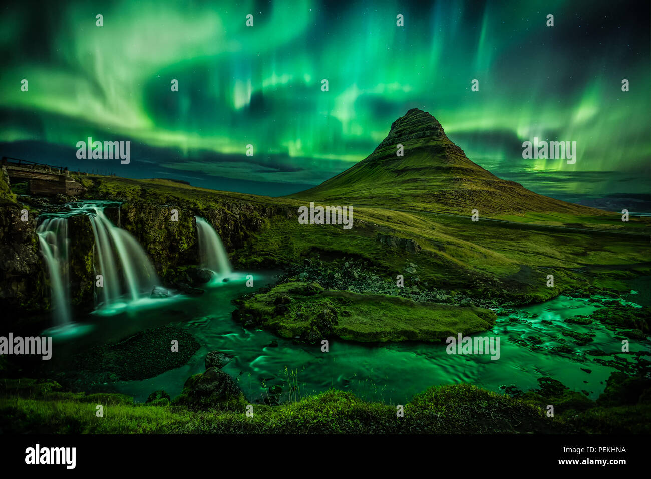 Aurora Borealis (Northern Lights) over Kirkjufell Mountain In Iceland Stock Photo