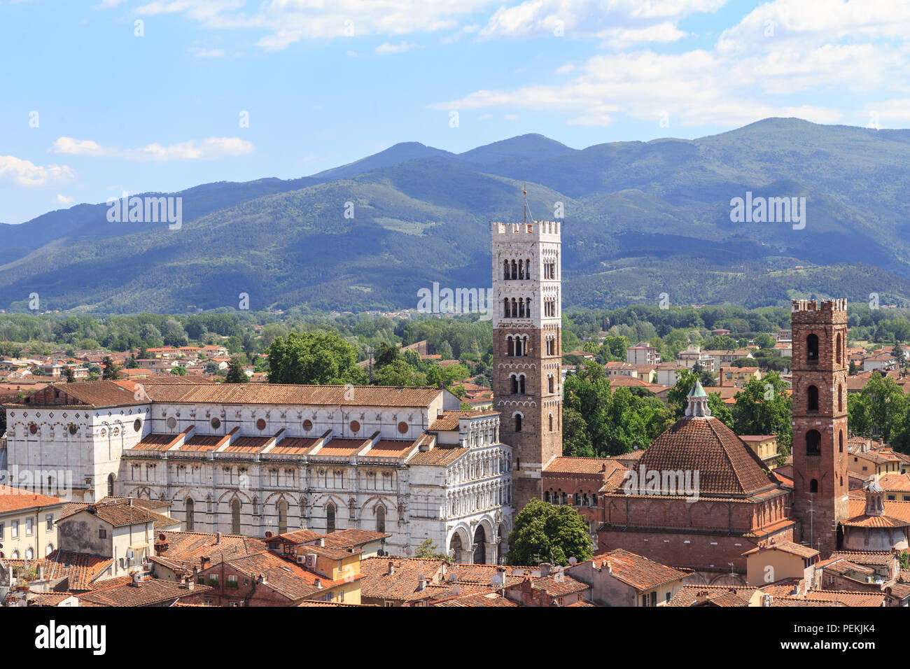 Romanesque Facade and bell tower of St. Martin  Cathedral in Lucca, Tuscany. It contains most precious relic in Lucca, Holy Face of Lucca.Volto Santo Stock Photo
