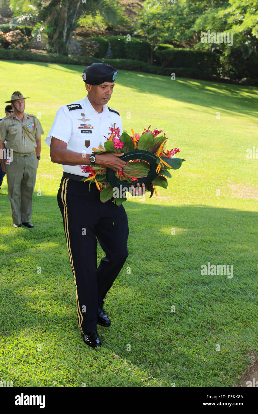 Gen. Vincent K. Brooks, commander, U.S. Army Pacific, prepares to lay a wreath at the Bomana Commonwealth Cemetery, Papua New Guinea, Jan. 13, 2016, during a tour of Pacific nations highlighting ground forces history and accomplishments. Bomana houses nearly 4,000 Australian, New Guinean and British casualties. (Photo by Master Sgt. Mark St. Clair, 25th Infantry Division) Stock Photo