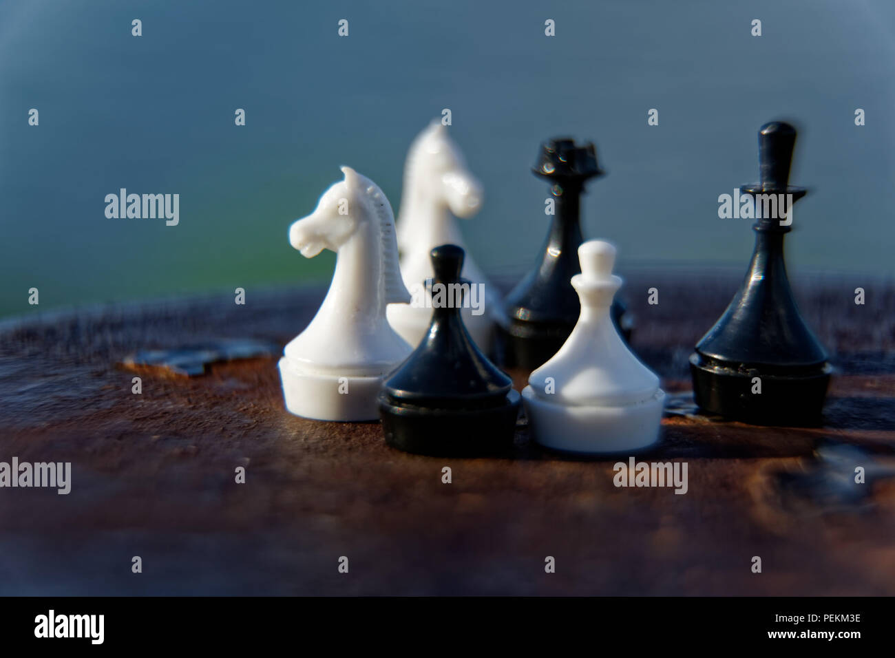 Premium Photo  Wooden chessboard with figures in light and dark brown  tones isolate on a white background