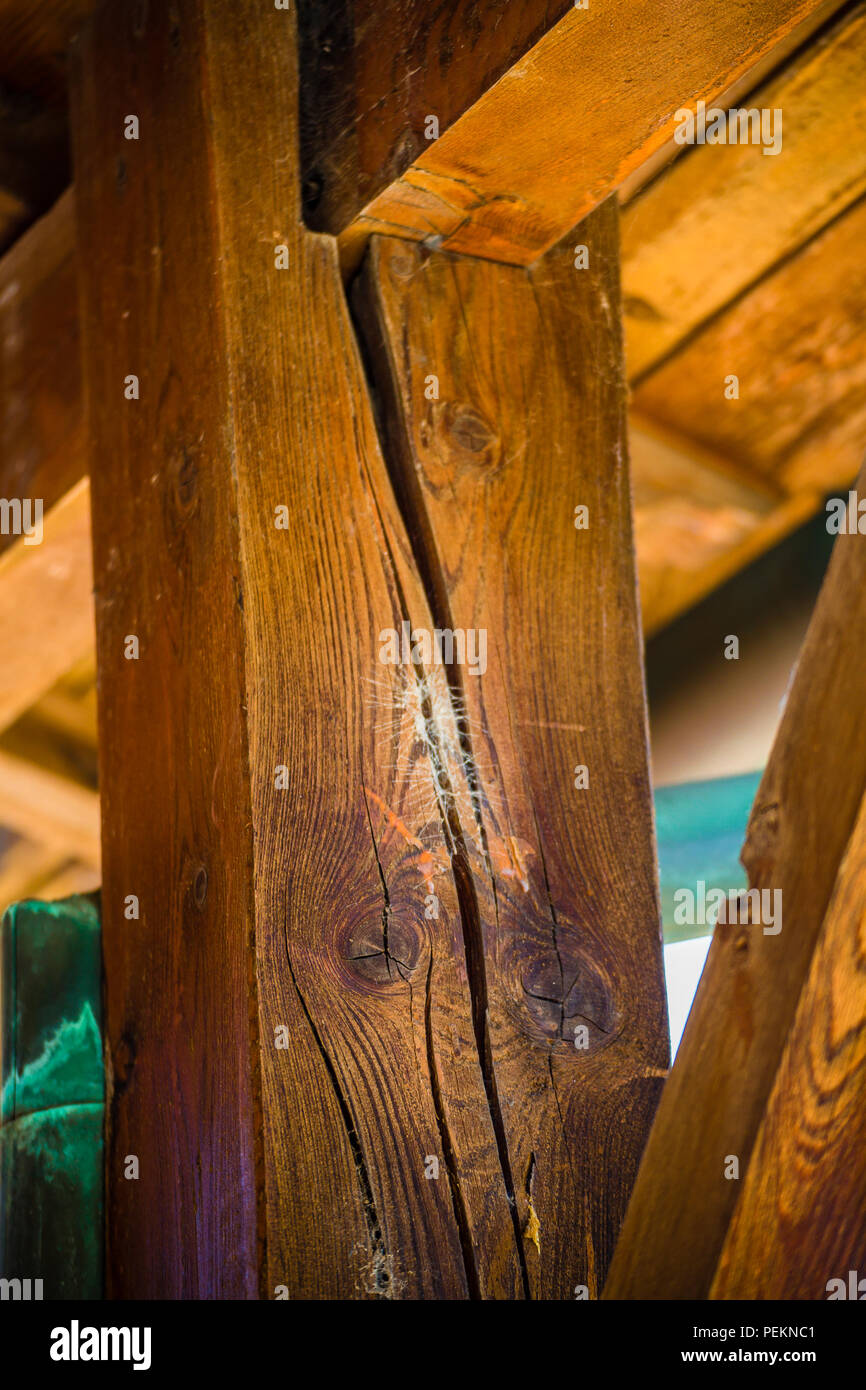 cracked wooden beam under old roof Stock Photo Alamy