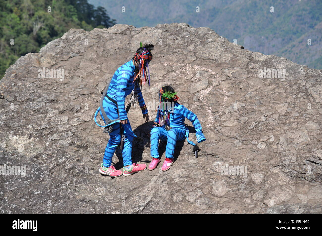2 young avatar girls Keytiri & Feytiri from Pandora, arriving at mt. Ulap  from a long journey down to earth,& enjoying the high-noon sun Stock Photo  - Alamy