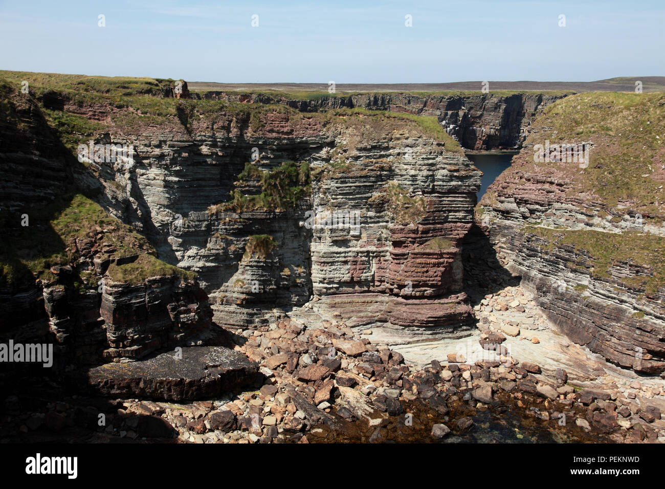 Geological strata from the Middle Devonian period in the rocks at Deerness, Orkney, Scotland Stock Photo
