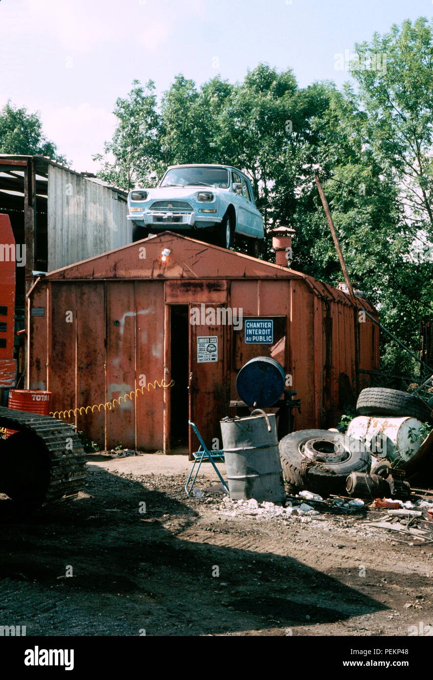 AJAXNETPHOTO. FRANCE - CLASSIC FRENCH SALOON CAR - 1961 - 1978 CITROEN AMI HUITE PARKED ON TOP OF A SCRAP YARD CONTAINER IN THE COUNTRYSIDE. PHOTO:JONATHAN EASTLAND/AJAX. REF:960305015 Stock Photo