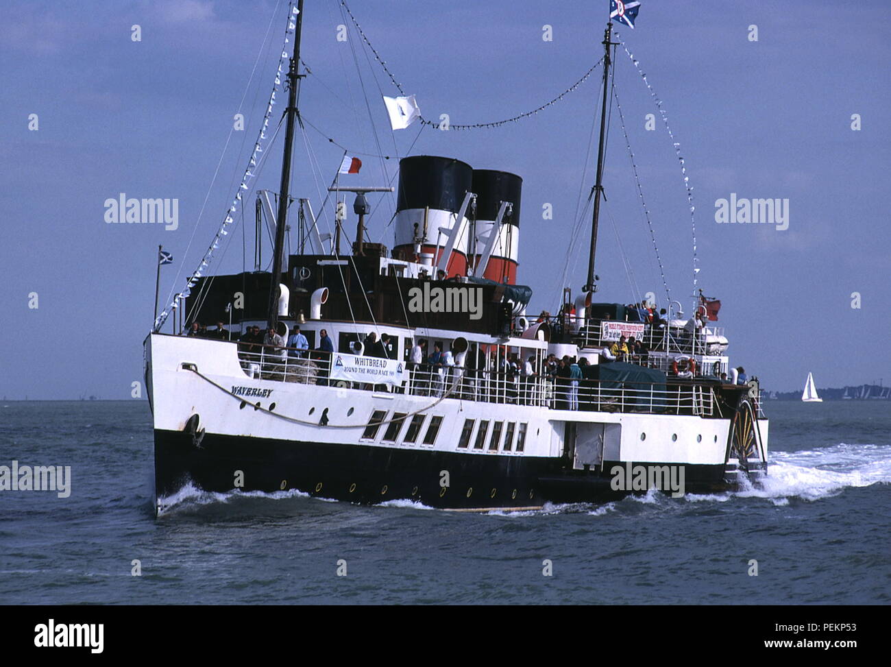 AJAXNETPHOTO. 1989. SOLENT, ENGLAND. - PADDLE STEAMER - RESTORED PASSENGER SIDE WHEL PADDLE STEAMER P.S.WAVERLEY UNDER WAY IN THE SOLENT.   PHOTO:JONATHAN EASTLAND/AJAX  REF:890803 Stock Photo