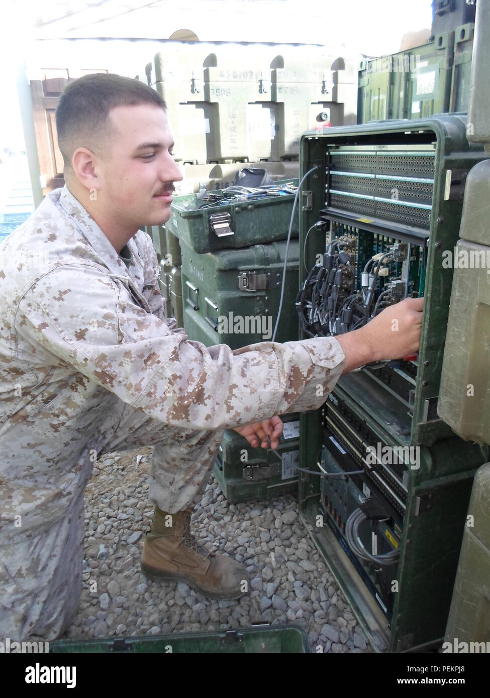 U.S. Marine Lance Cpl. Carlen Stone Gordon, a tactical switchboard