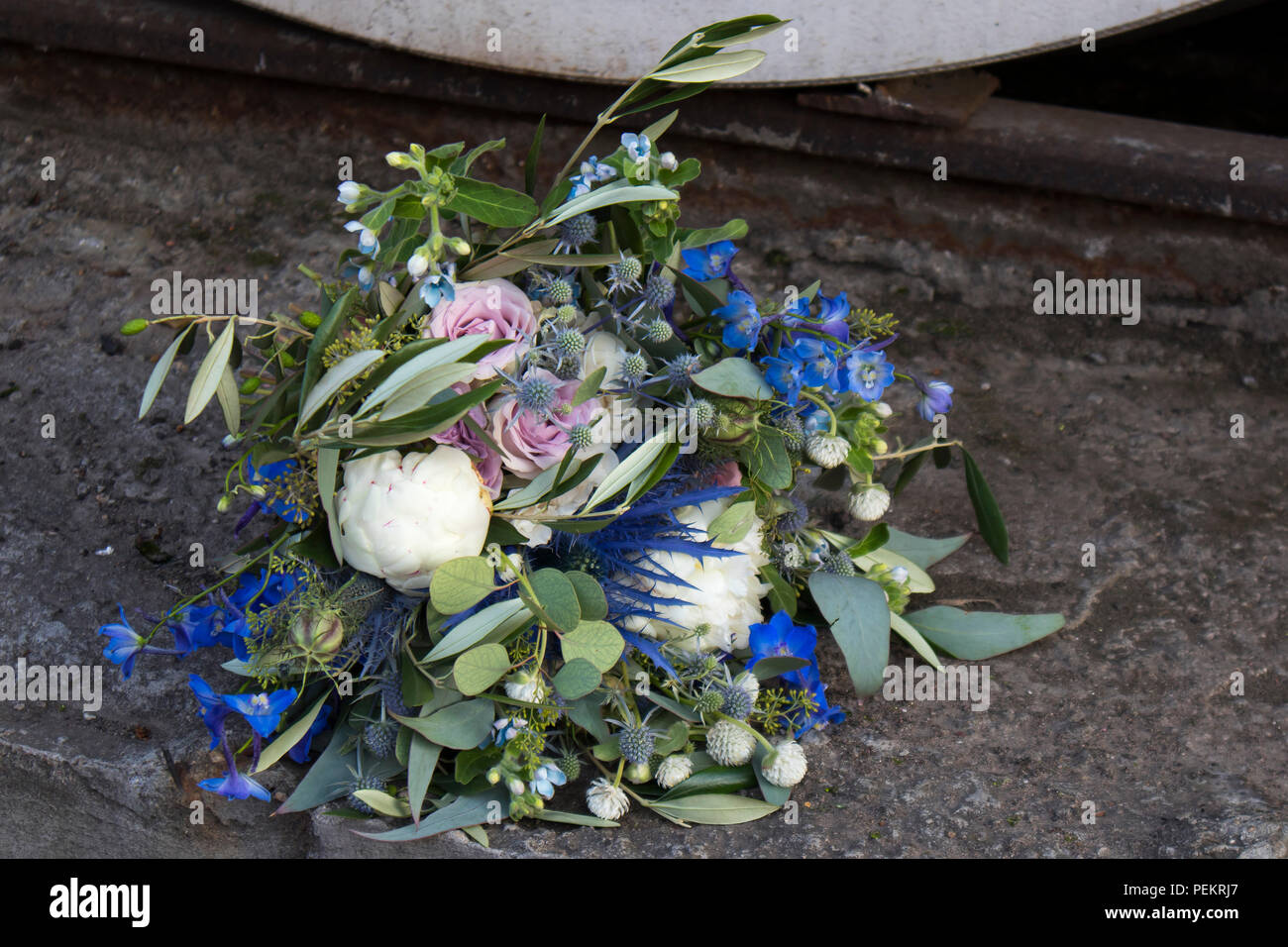 the Wedding bouquet of dried flowers, eucalyptus, peony, dahlias and dolphinium Stock Photo