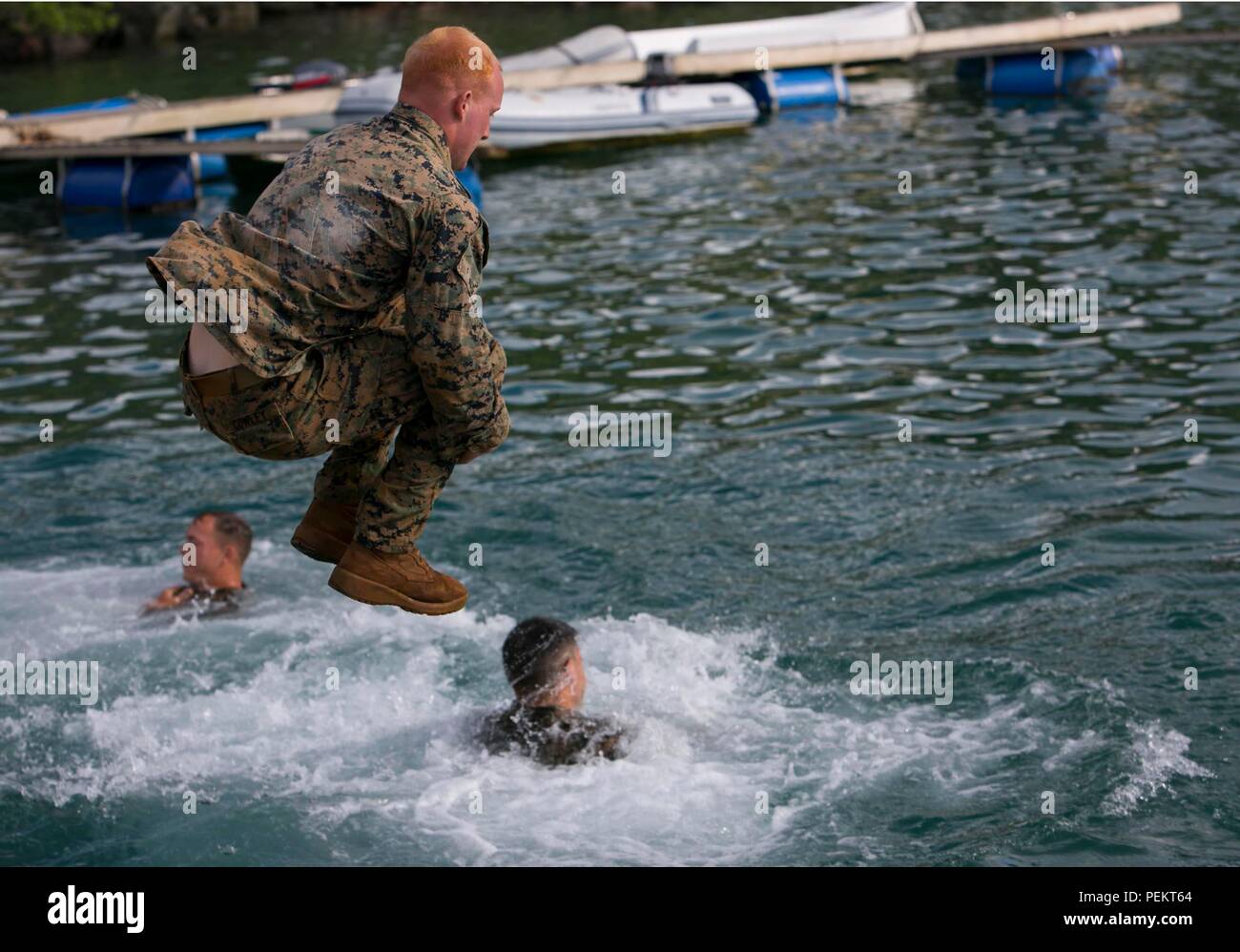 U.S. Marines with 1st Battalion, 2nd Marine Regiment, conduct a swim