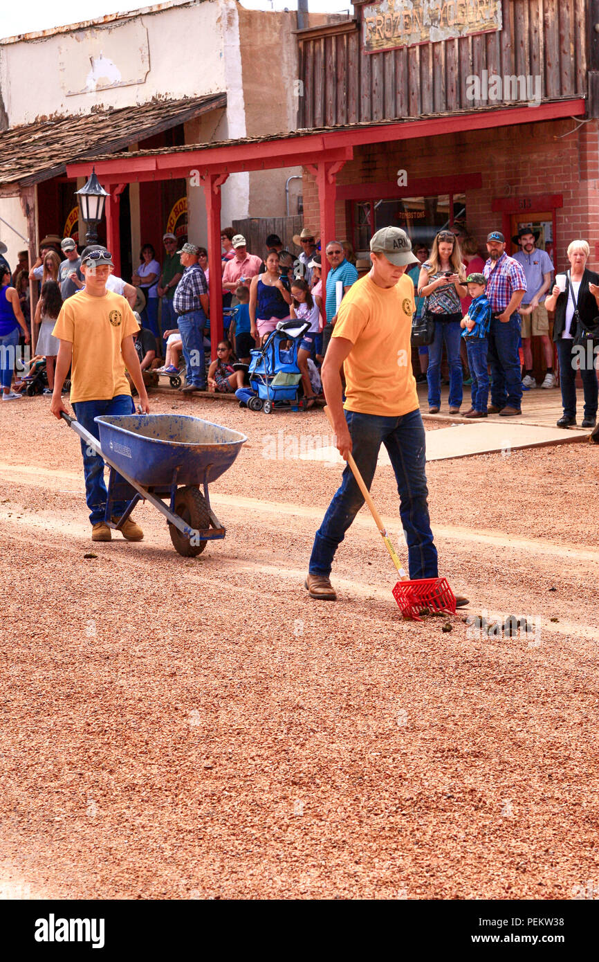 Horse manure clean up crew at the annual Doc Holiday parade in
