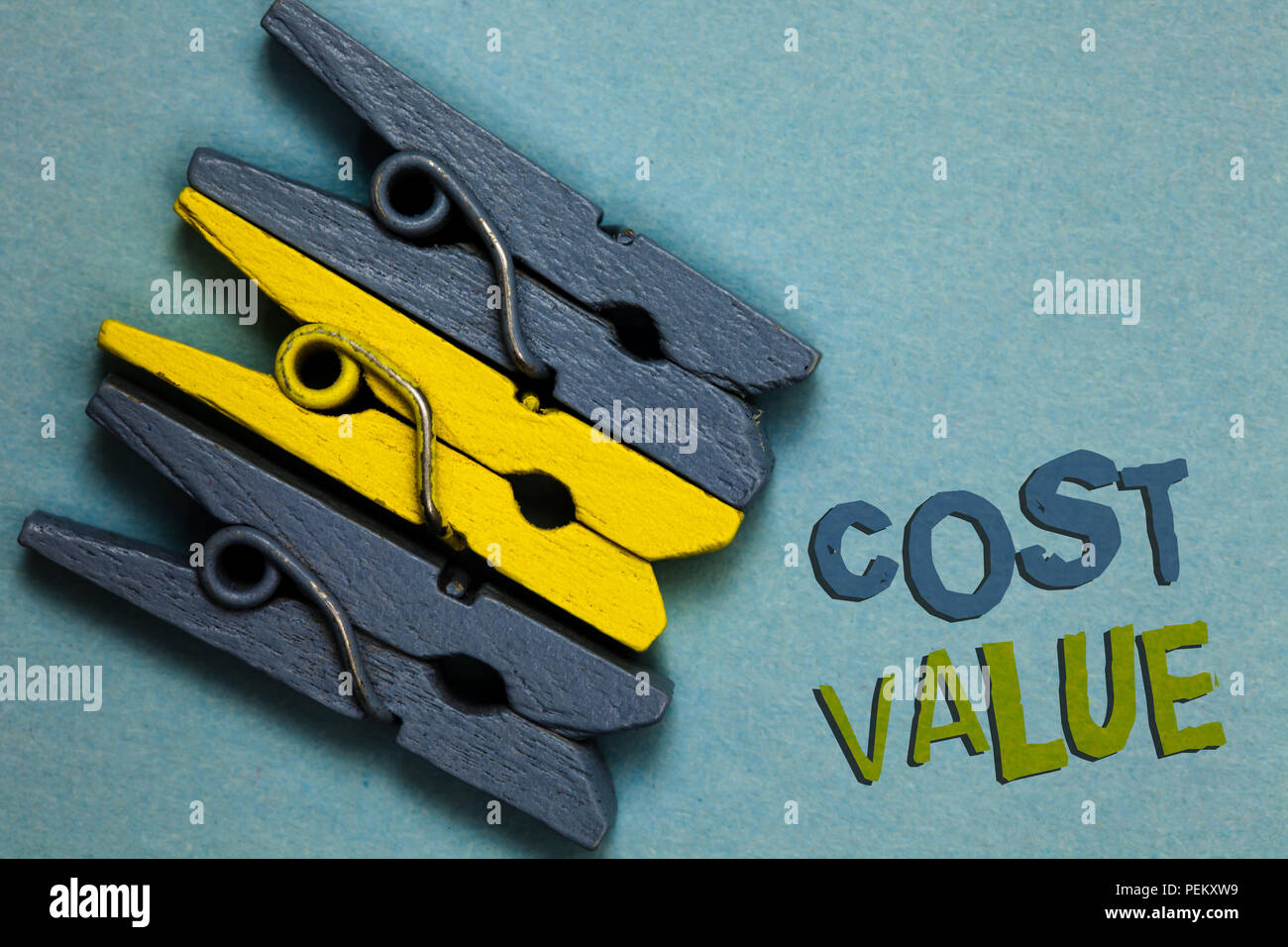 Conceptual hand writing showing Cost Value. Business photo text The amount that usualy paid for a item you buy or hiring a person Gray yellow vintage  Stock Photo