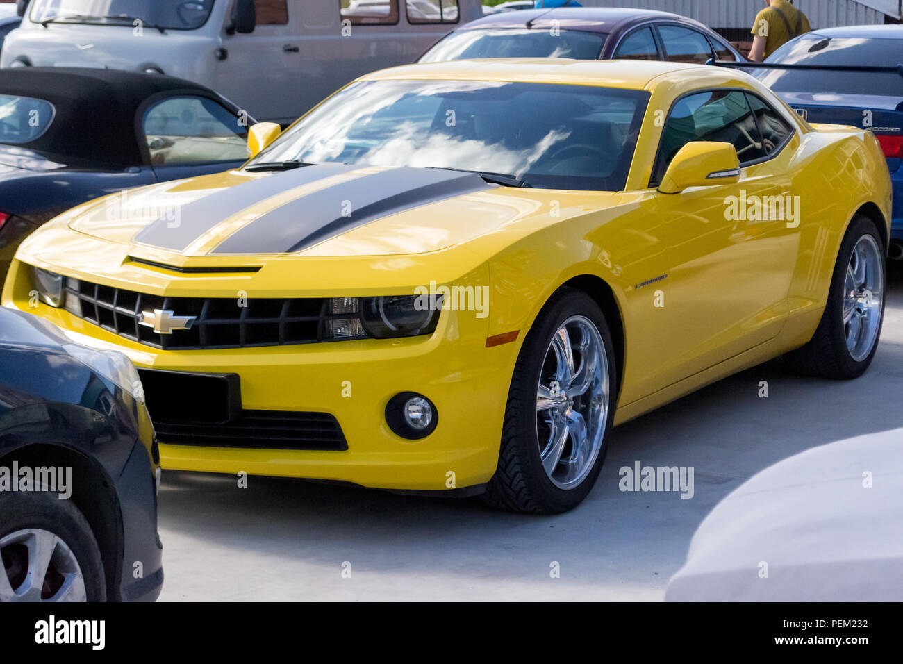 Novosibirsk Russia 07 06 2018 Chevrolet Camaro Yellow With Black Stripes On The Hood And Chrome Cast Wheels In The Form Of A Bumblebee Autobot Tra Stock Photo Alamy