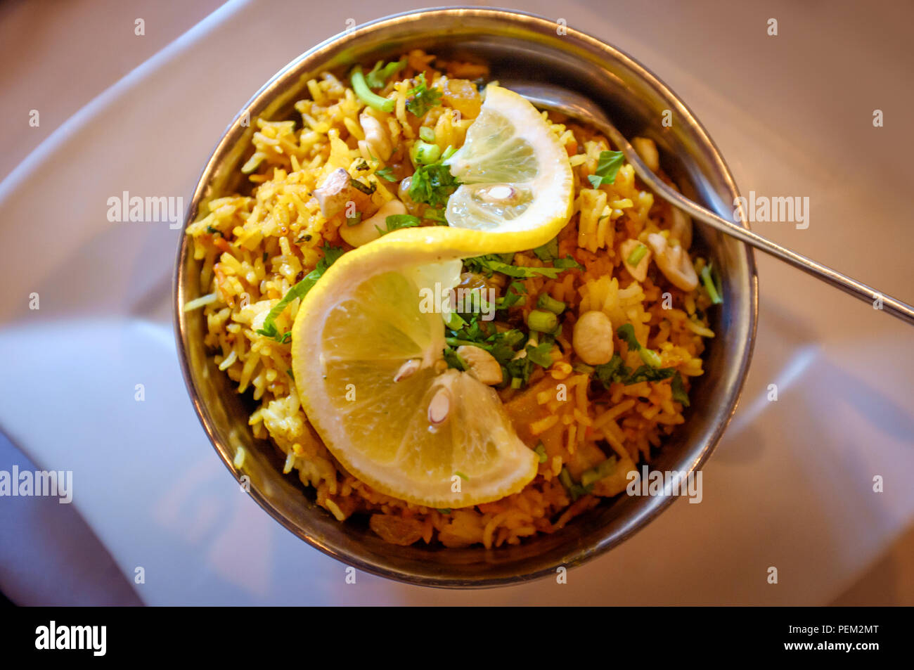 Chicken biryani raisins hi-res stock photography and images - Alamy