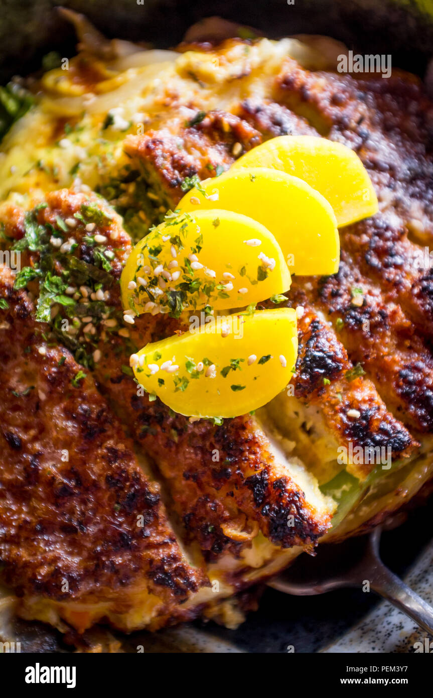 Japanese crispy pork katsudon rice bowl with takuan daikon radish
