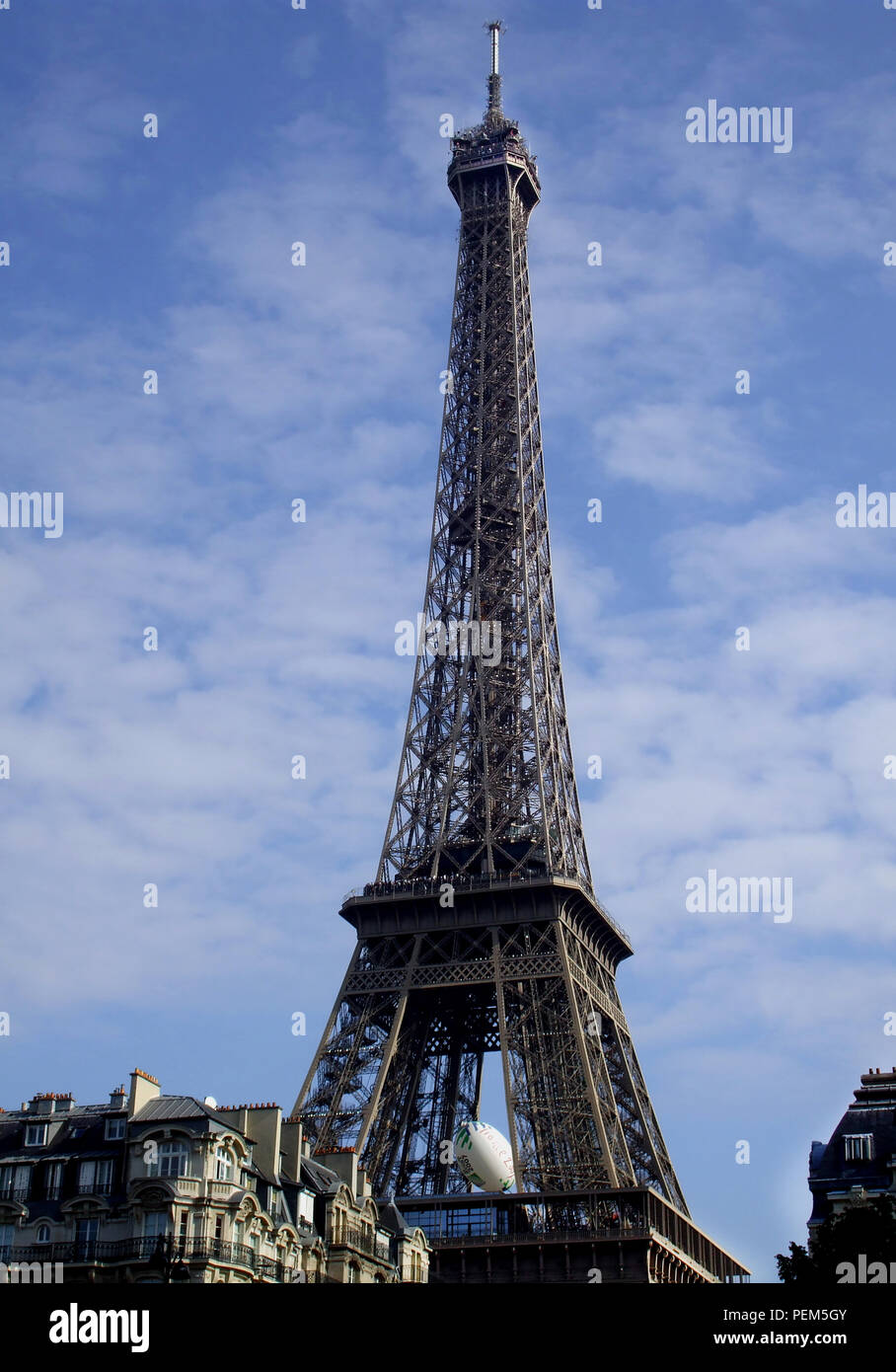 The iconic structure - The Eiffel Tower, which stands in Paris France. It was designed and built by Gustave Eiffel. It was started in January 1887 and is now the most visited paid monument in the world. It is 324 metres tall and is made from an iron lattice and held together by millions of rivets. Stock Photo