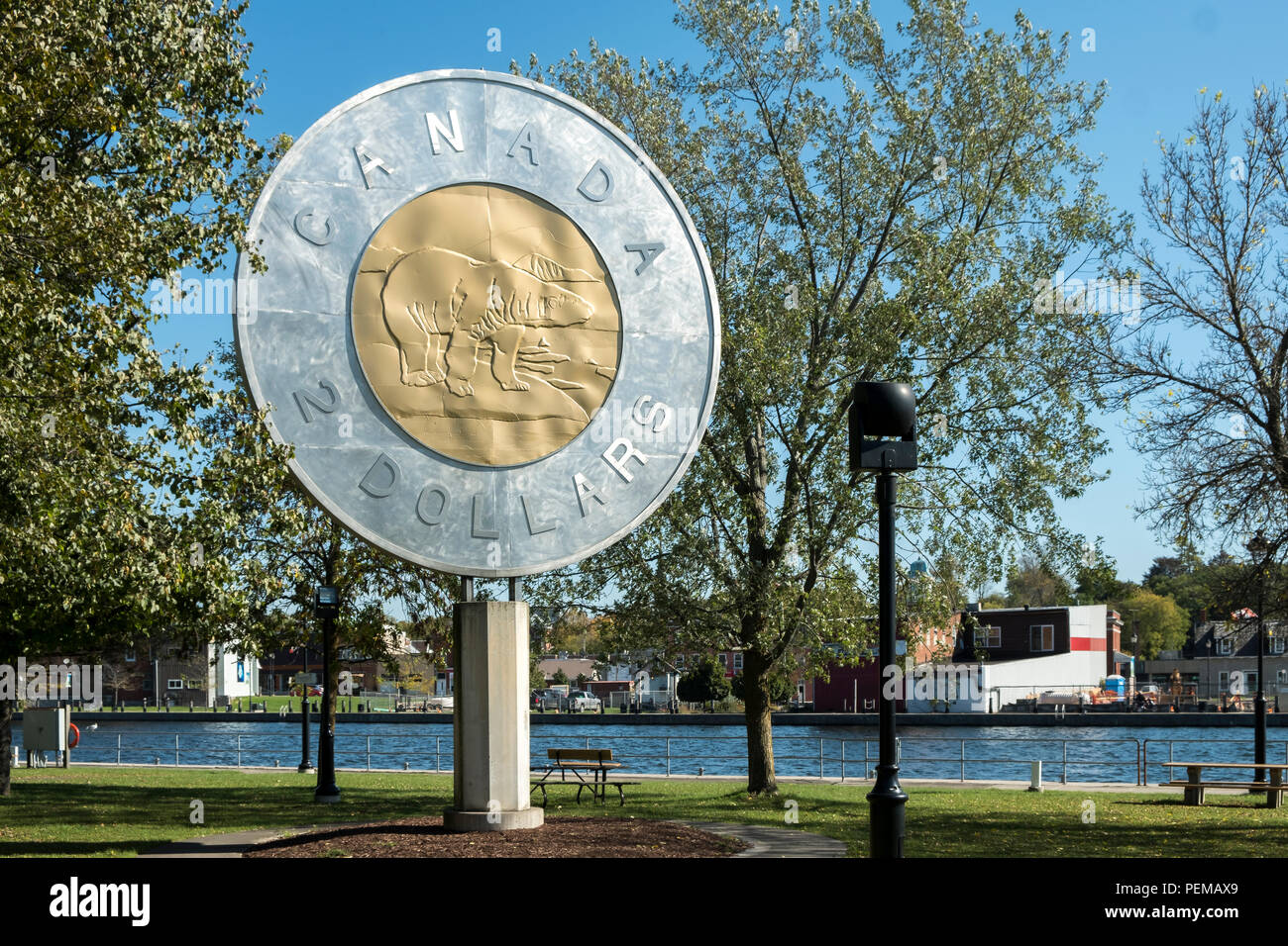 The giant Canadian Two dollar coin or toonie can be found in Old Mill Park in campbell ford Ontario Canada. Stock Photo