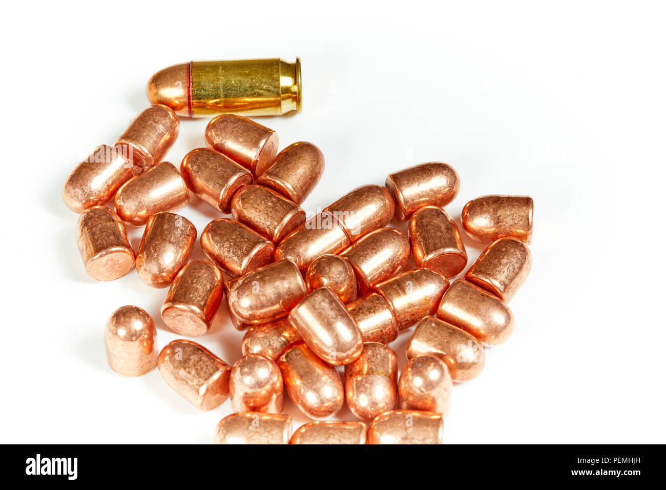 A pile of copper bullet heads isolated on white Stock Photo Alamy