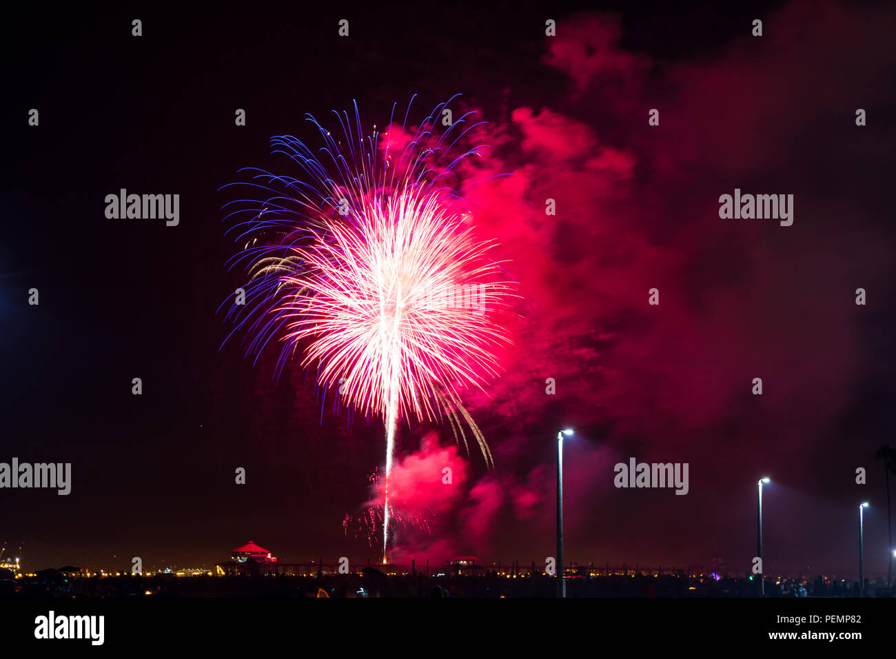 4th of July fireworks over the Huntington Beach Pier Stock Photo