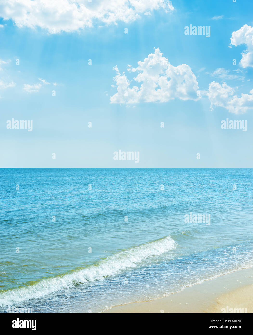 blue sky with clouds over sea and sand beach Stock Photo - Alamy