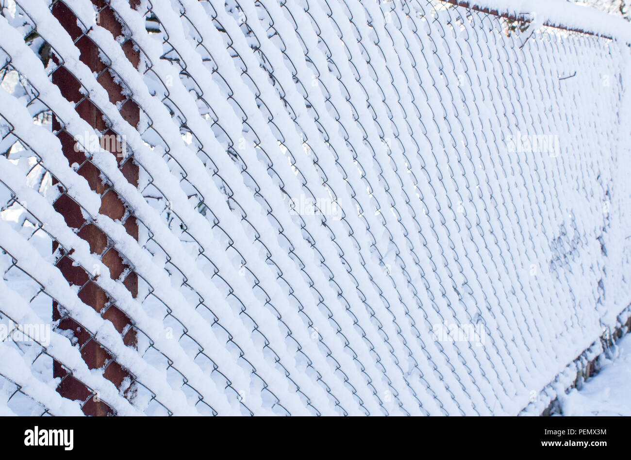Iron Fence In The Snow Lattice Fence Covered With Snow Stock Photo Alamy