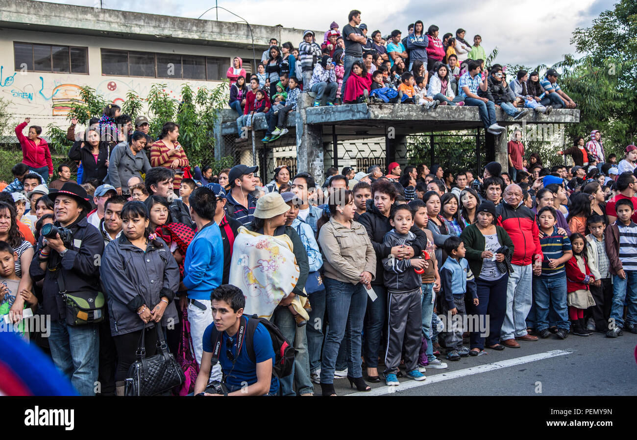 Cuenca, Ecuador / Jan 6, 2013: Crowd waits for parade to arrive Stock Photo