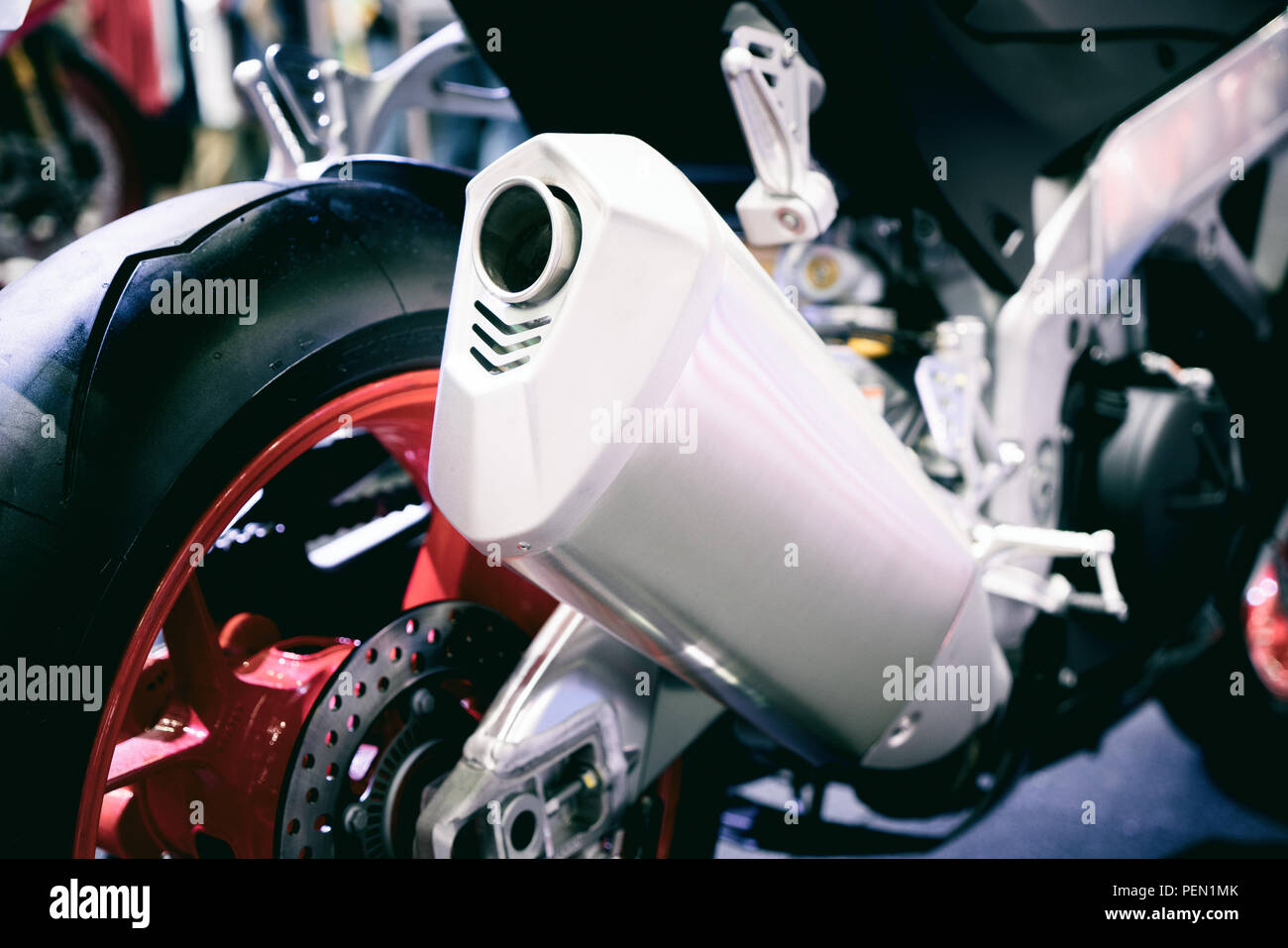 Closeup of exhaust or intake of racing motorcycle. Low angle photograph of motorcycle. Stock Photo