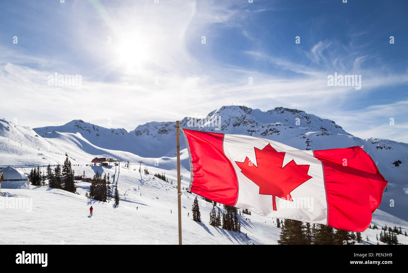 Canadian flag flying near the Rendezvous on top of Whistler Mountain. Stock Photo