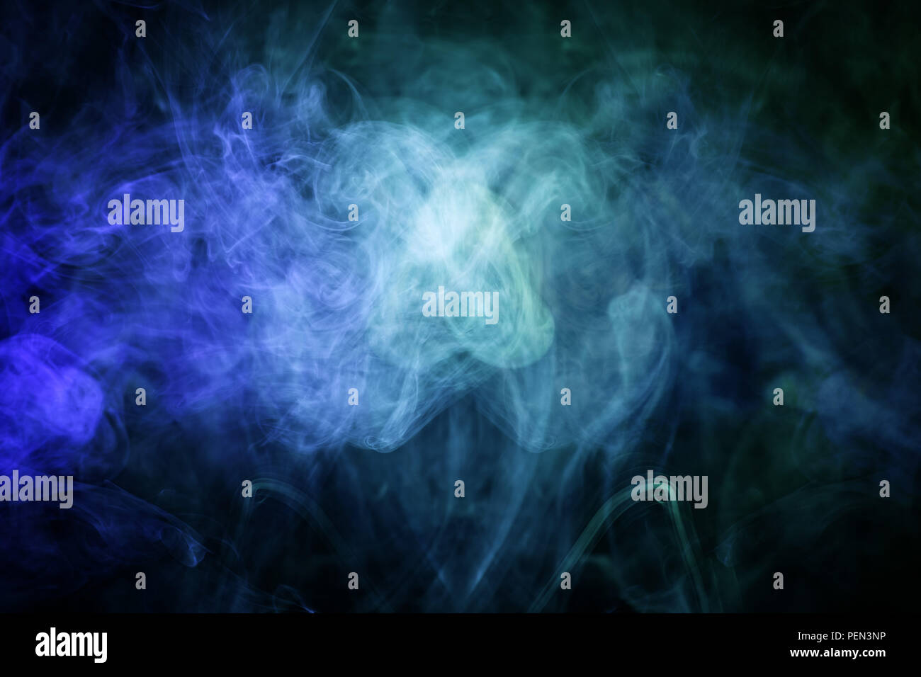 Cloud of blue and green smoke on a black isolated background ...