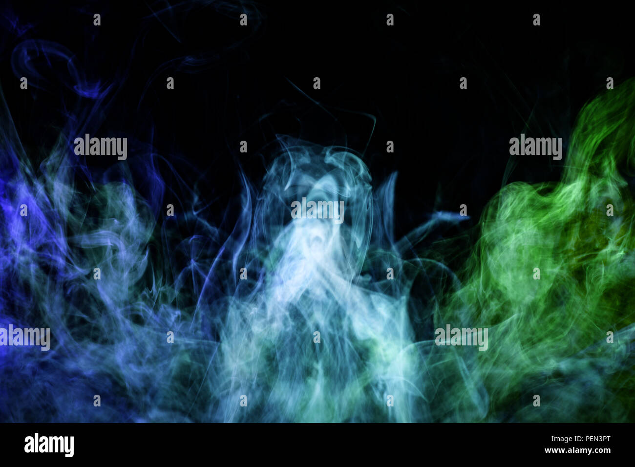 Cloud of blue and green smoke on a black isolated background ...