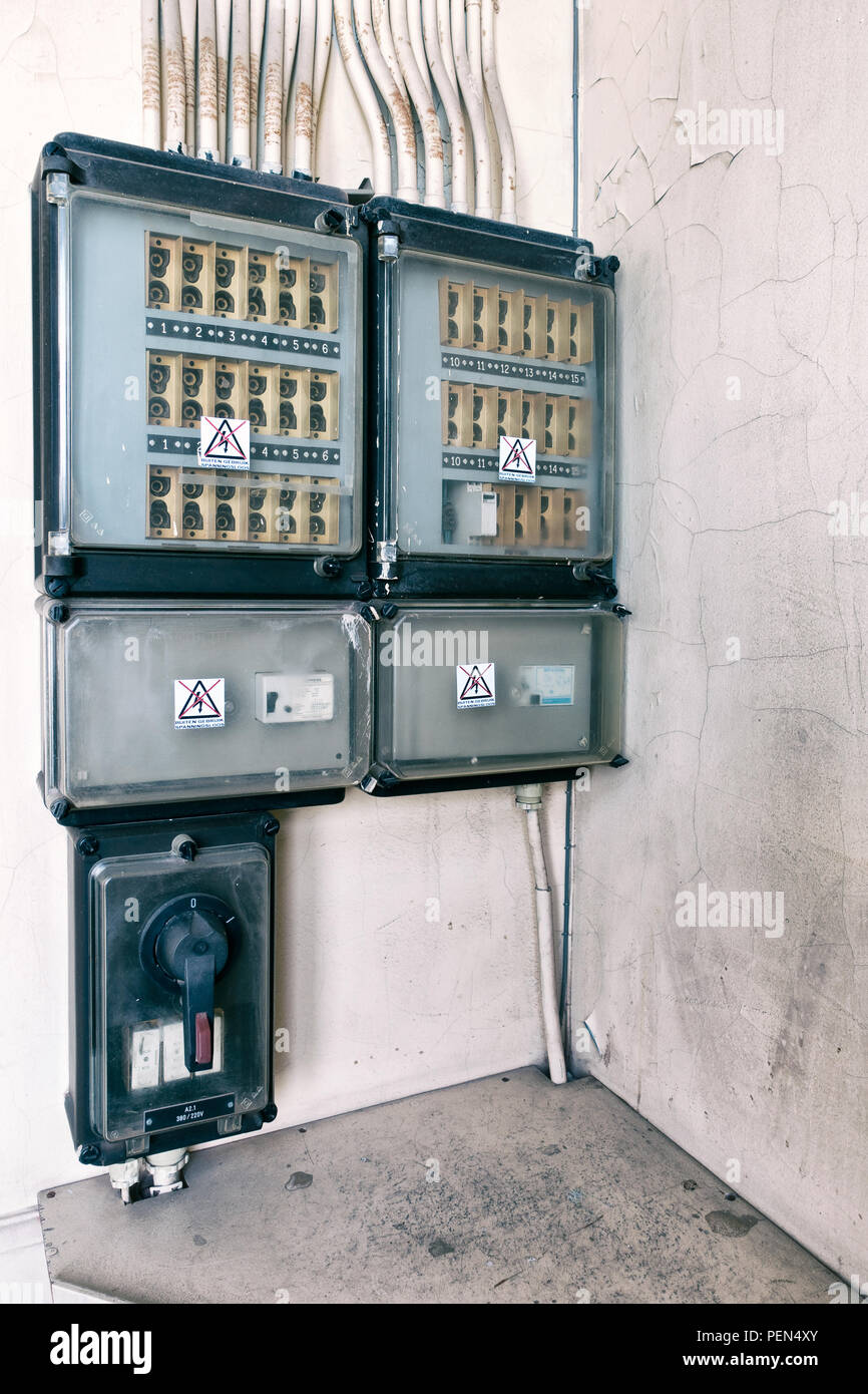 Old fuse box with fuses and main switch, ensure safety of the electricity Stock Photo