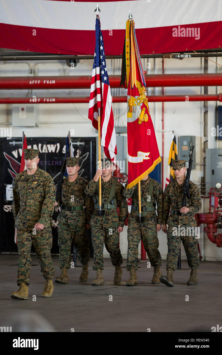 Marines march on the colors during a change of command ceremony aboard Marine Corps Air Station Beaufort, Dec. 10. Lt. Col. Alvin Bryant relinquished command of Marine All-Weather Fighter Attack Squadron 533 to Lt. Col. Mathew A. Brown. The Marines are with VMFA(AW)-533. Stock Photo