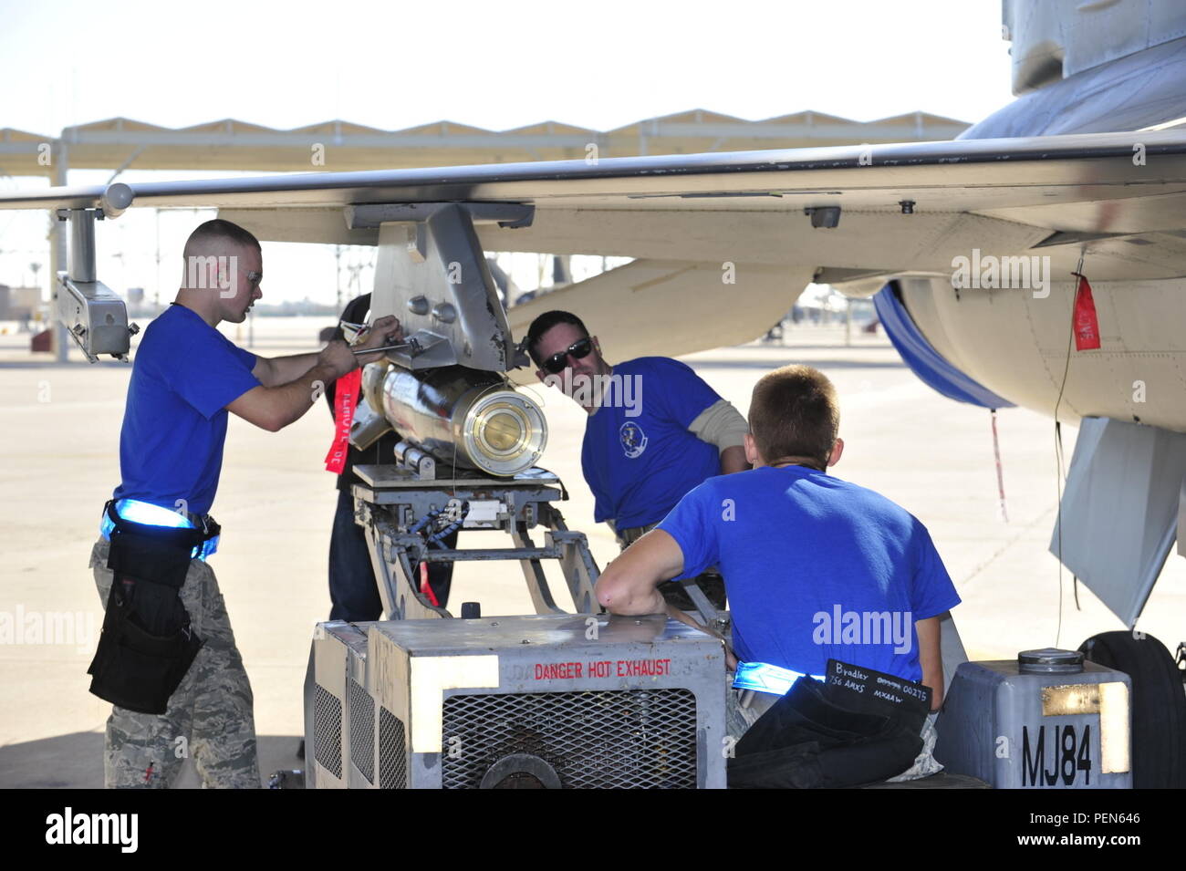 The 309th Aircraft Maintenance Unit weapons load crew members, prepare