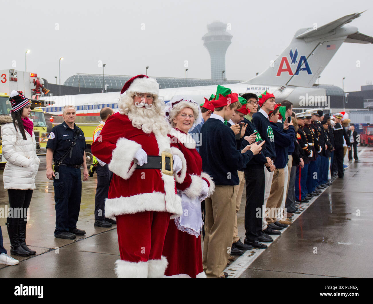 Army Reserve, Navy and Marine Corps members from the greater Chicago area arrived to send off the families participating in the Snowball Express, minus the actual snow, on Dec. 12. The program is sponsored by American Airlines, coordinating flights from 84 cities via nearly 60 chartered and commercial flights. The Snowball Express is a nonprofit organization established in 2006, providing an all-expenses-paid trip to families across the United States with a mission of bringing hope and new memories to the children of military heroes who have died while on active duty since Sep. 11, 2001. This  Stock Photo