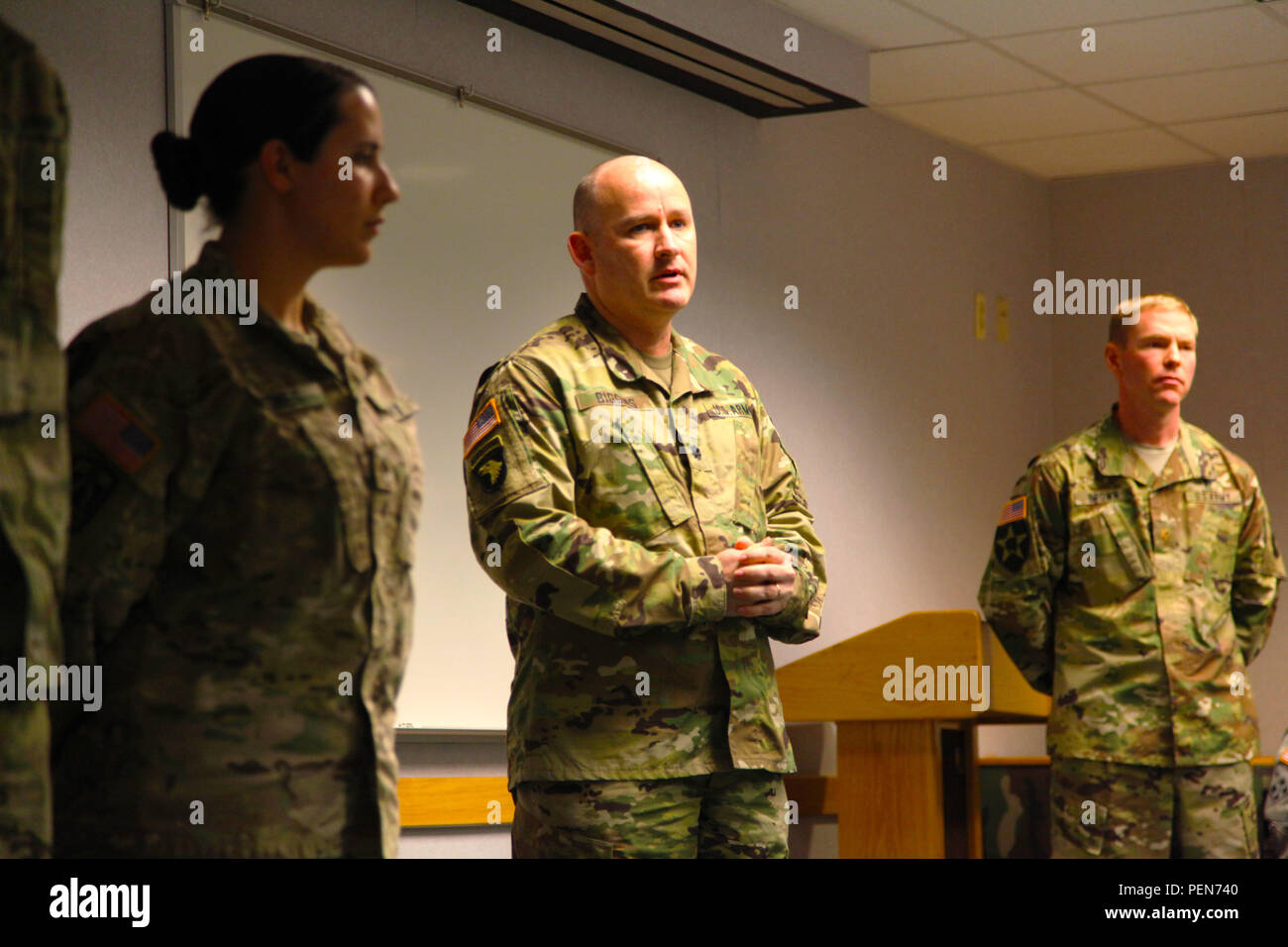 https://c8.alamy.com/comp/PEN740/us-army-lt-col-david-biggins-commander-of-the-114th-signal-battalion-speaks-to-the-deployment-team-during-the-deployment-farewell-ceremony-at-fort-george-g-meade-md-dec-3-2015-the-55th-signal-company-deploys-soldiers-regularly-to-locations-all-over-the-world-us-army-photo-by-spc-eric-hurtadoreleased-PEN740.jpg