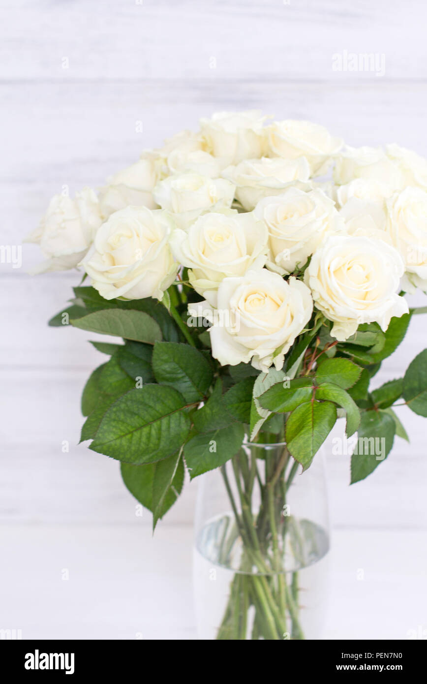 Bouquet of white roses in a vase. Bouquet of chic white roses Stock ...