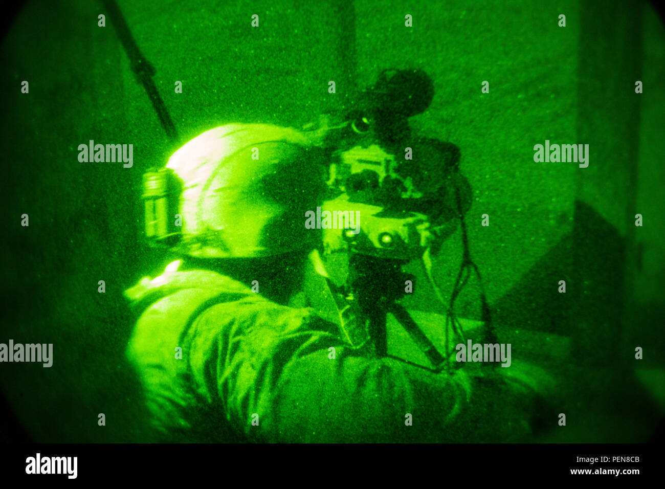 U.S. Marine Corps Cpl. Sheldon Muse, radio operator, with 1st Air Naval  Gunfire Liaison Company, Special Purpose Marine Air-Ground Task Force-Crisis  Response-Central Command, uses an AN/PAS-25 thermal laser spot imager to  locate