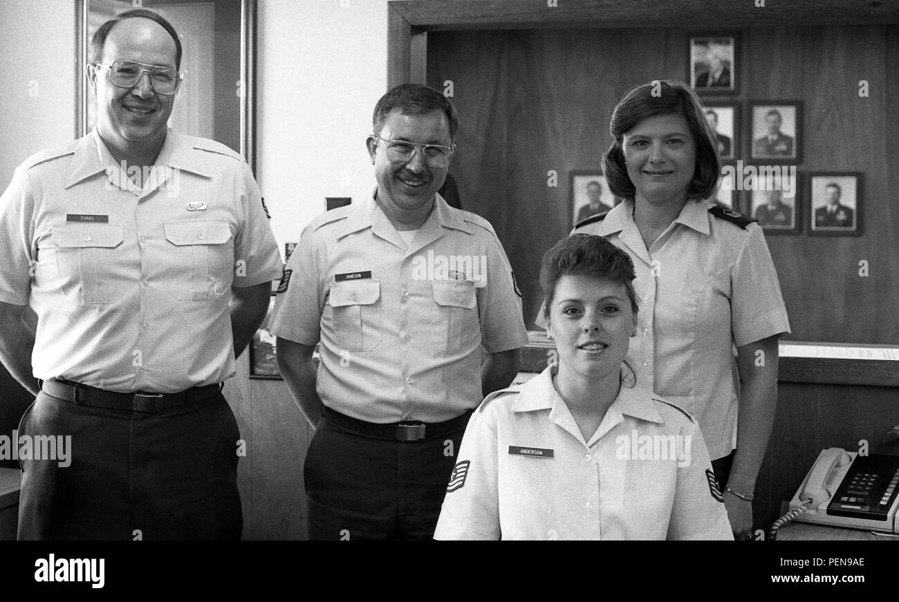 Mike Evans, Jack Jameson and Charlotte Brown gather for a photo with Tech. Sgt. Jean (Allen) Anderson, at the Portland Air National Guard Base, Ore., in 1990. Allen retired after more than 32 years of service on Dec. 22, 2015. (Air Nation Guard photo courtesy of the 142nd Fighter Wing History Office) Stock Photo