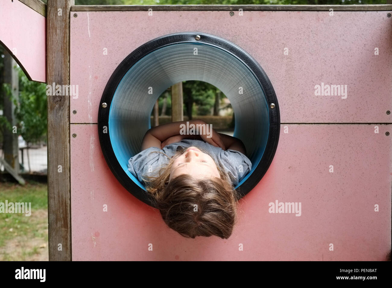 A child bored with the summer holidays, pictured in France 2018. Stock Photo