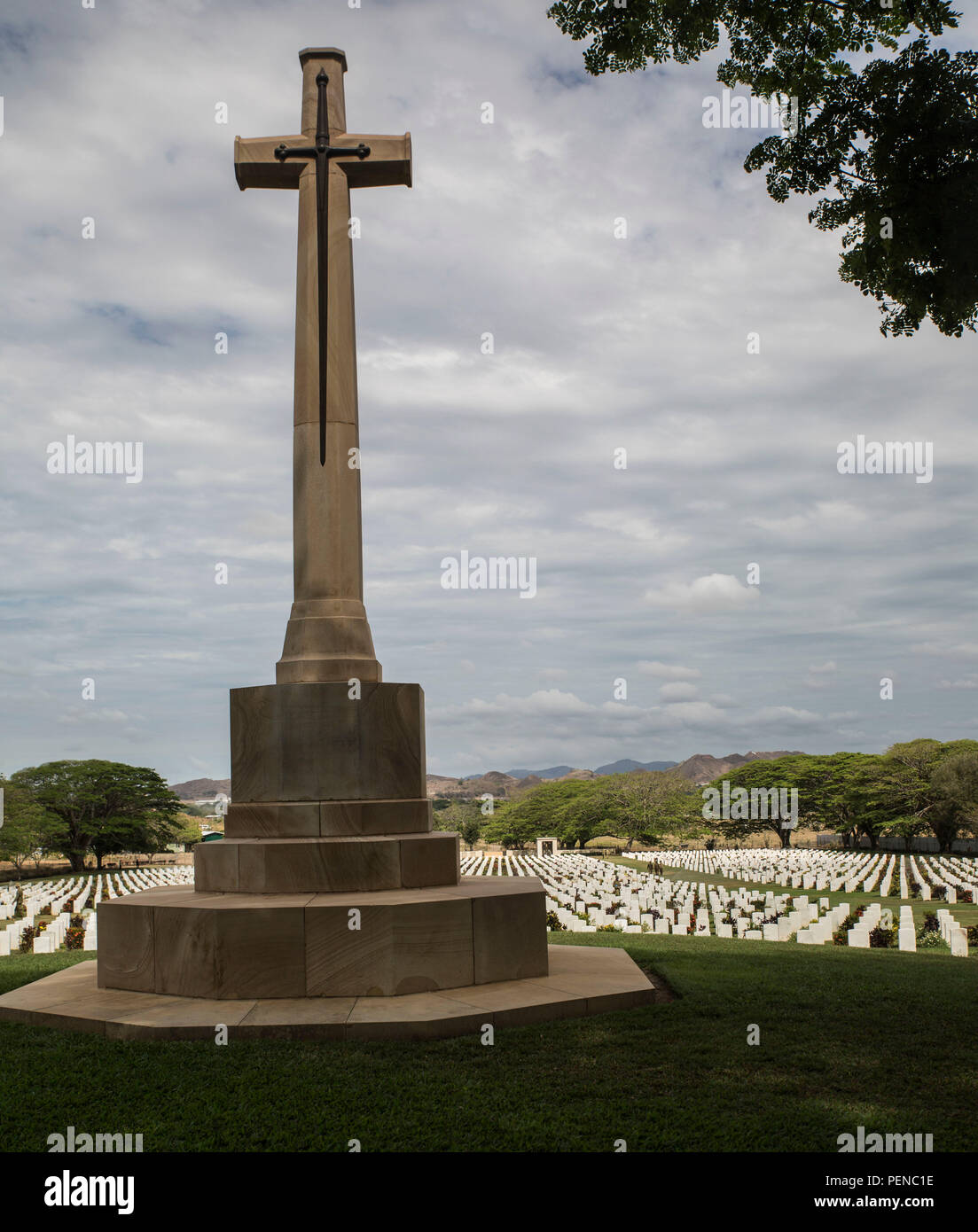 Australian, U.S., British and Papua New Guinean service members visit the Bomana War Cemetery Sept. 27, 2015, during a trip to the Kokoda Trail as part of Exercise Puk Puk 15. The cemetery is home to 13,000 service members from the battles on Papua New Guinea during WWII when coalition forces fought the Japanese Empire after they invaded the north coast of Papua New Guinea. The multinational exercise Puk Puk 15 is designed to provide positive and enduring change in Papua New Guinea through infrastructure rehabilitation and basic military training. (U.S. Marine Corps photo by Cpl. William Heste Stock Photo